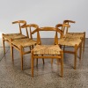 A Set of Five Hans Wegner Style Dining Chairs