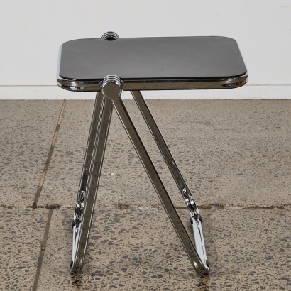 A Folding Chromed Plastic Side Table