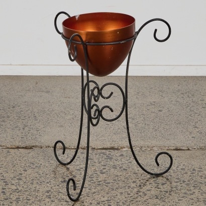 A Retro Planter on Wrought Iron Base