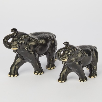 A Pair Of Ceramic Elephants