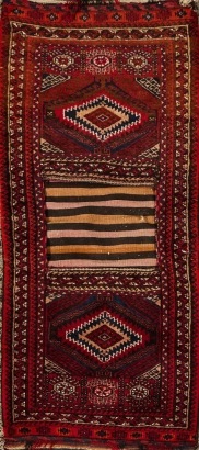 A Vintage Handwoven Sadlebag Rug