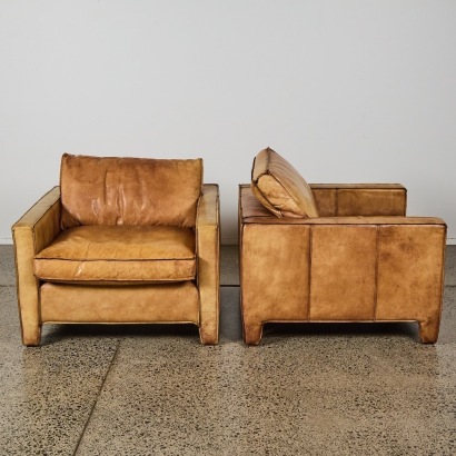 A Pair of Coco Republic Leather Armchairs