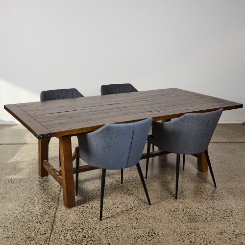 A Solid Wood Dining Suite with Four Padded Chairs