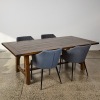 A Solid Wood Dining Suite with Four Padded Chairs