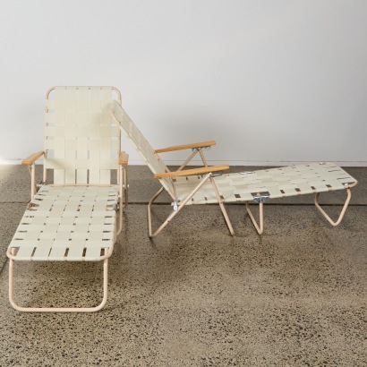 A Pair Of Foldable Sun Loungers