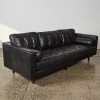 A Modern MCM Style Black Leather Couch