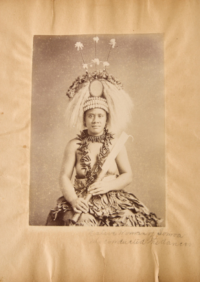 THOMAS ANDREW An album page with a Samoan Ceremonial Dancer by photographer Thomas Andrew, and studio photograph of a Samoan woman verso