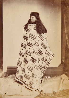 UNKNOWN PHOTOGRAPHER A full length studio portrait of a Māori wahine wearing a korowai