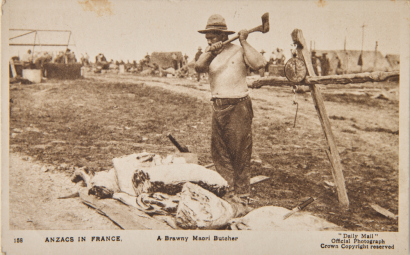 DAILY MAIL ANZACS in France. A Brawny Māori Butcher. A Māori solder using an axe to crop up meat on the Western Front.