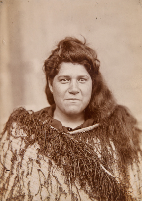 UNKNOWN PHOTOGRAPHER Head and shoulders portrait of a woman in puipui