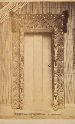 UNKNOWN PHOTOGRAPHER A carved waharoa. Door to Marae