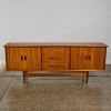 A Mid Century Sculptured Sideboard