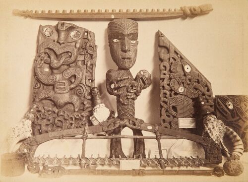 JOSIAH MARTIN Album Page Featuring a Study of Carved Objects Including a Putatara, Rou Kakahi and Patutu Pataka and a Study of a Kumete and Waka Huia by Josiah Martin