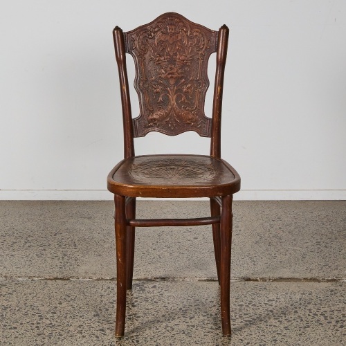 A Jacob & Josef Kohn Bentwood Chair with Cherub Design