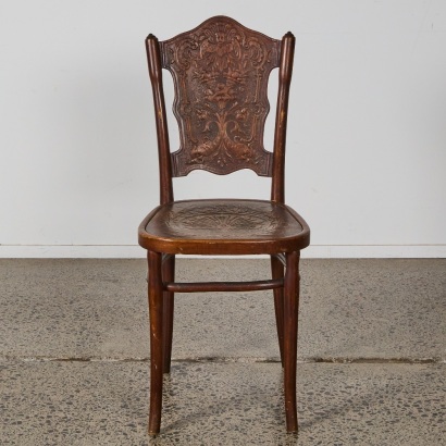 A Jacob & Josef Kohn Bentwood Chair with Cherub Design