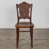 A Jacob & Josef Kohn Bentwood Chair with Cherub Design