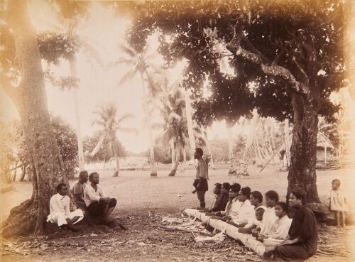 JOSIAH MARTIN An Album Page Featuring a Photograph of Tapa Making in Tonga by Josiah Martin and Another Picture of Tapa Making by an Unknown Photographer