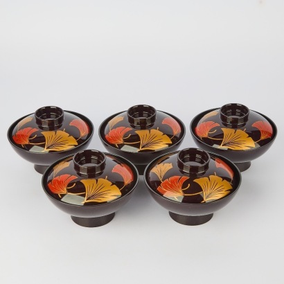 A Set of Five 20th Century Japanese Black Lacquer Covered &sbquo;Gold-Decorated&sbquo;Bowls