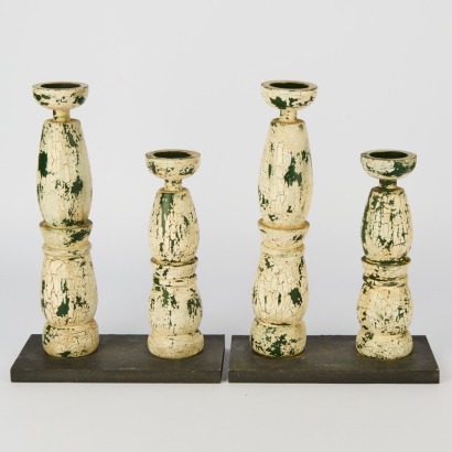 A Pair of White and Green Candle Holders