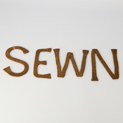 A Set of Four Vintage Forged Iron Letters 'MENS'