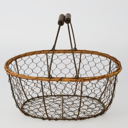 A Vintage Oval Wire Basket with Wooden Handles