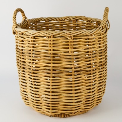 A Vintage Woven Wicker Storage Basket with Handles