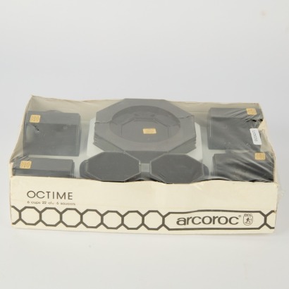 An Arcoroc France Octime Black Glass Cup and Saucer Set