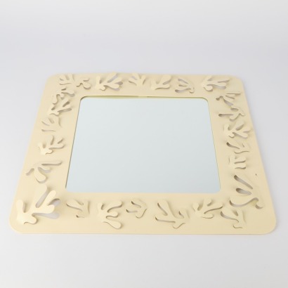 A Cream Enamelled Metal Decorative Mirror