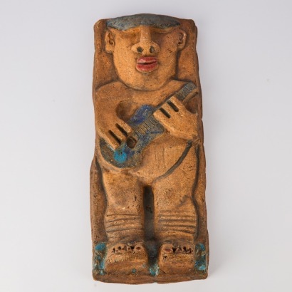 A Vintage Terracotta Guitar Player Wall Plague