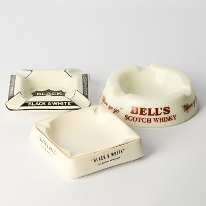 A Trio of Vintage two Black & White Scotch Whisky and one Bells Scotch Whisky Ashtrays