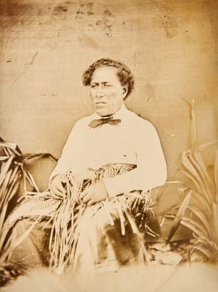 UNKNOWN PHOTOGRAPHER An Album Page Featuring Portraits of Siaosi Tuku'aho and Two Other Unidetifiable Subjects by an Unknown Photographer