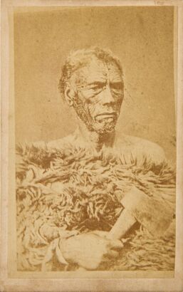 AMERICAN PHOTOGRAPHIC COMPANY (AUCKLAND) Studio portrait of a Māori man identified as Kuitu.