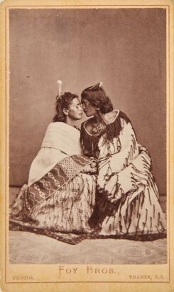 FOY BROTHERS Two Carte de visite full-length studio portraits. A male and two female Māori subjects posing in cloaks
