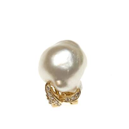 A single pearl and diamond earring, a baroque pearl measuring 16.4mm in a diamond set surmount. 18ct yellow gold. Weight 6.3 grams.