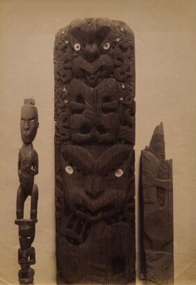 JOSIAH MARTIN A Tekoteko, a poupou taken from a pataka, and a fragment of a carving with stylised figures and koru.