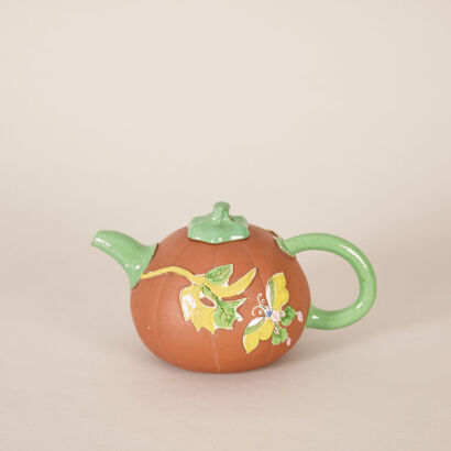 A Chinese Late Qing Dynasty Coloured Red Clay Melon-shaped Teapot