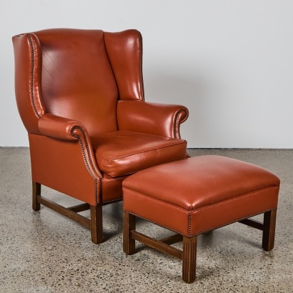 A Brown Leather High Back Easy Chair & Ottoman