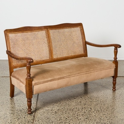 A French Bergre Style Cane-Back Settee With Upholstered Seat