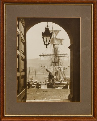 A Framed Reproduction Photograph of Whitby Dock Yorkshire