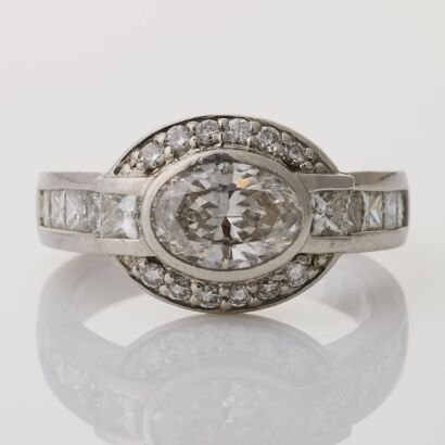 Platinum, Modern, 1.00ct Oval Diamond / 1.09ct Diamond Cluster Ring