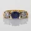 18ct White / Yellow Gold, 0.98ct Sapphire / 0.59ct Diamond Three Stone Ring