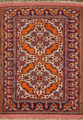 A Hand-Knotted Silk and Wool Rug in Vibrant Orange