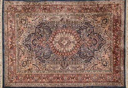 A Heriz Persian Hand-Knotted Wool and Silk Rug