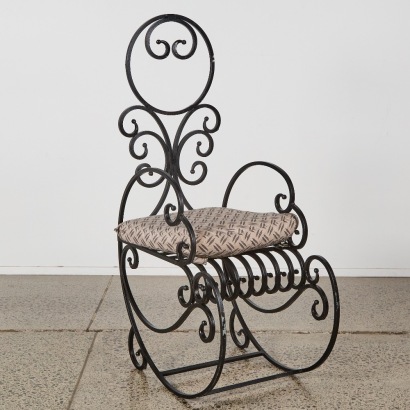 A Wrought Iron Armchair