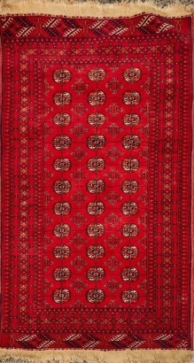 A Vintage Hand-Knotted Wool Bokhara Rug