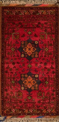 A Small Handknotted Aghan Baluchi Rug