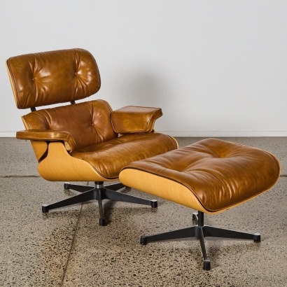 An Eames Style Lounge Chair and Ottoman