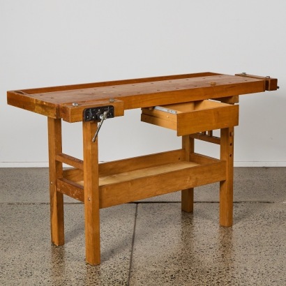 A Solid Woodworkers Bench With Two Vices