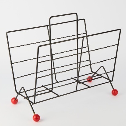 A Vintage Atomic Magazine Holder