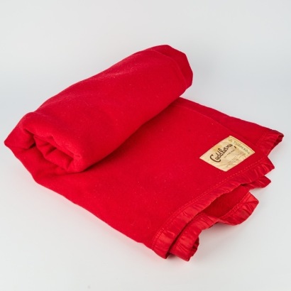 A Red NZ Woollen Travel Rug